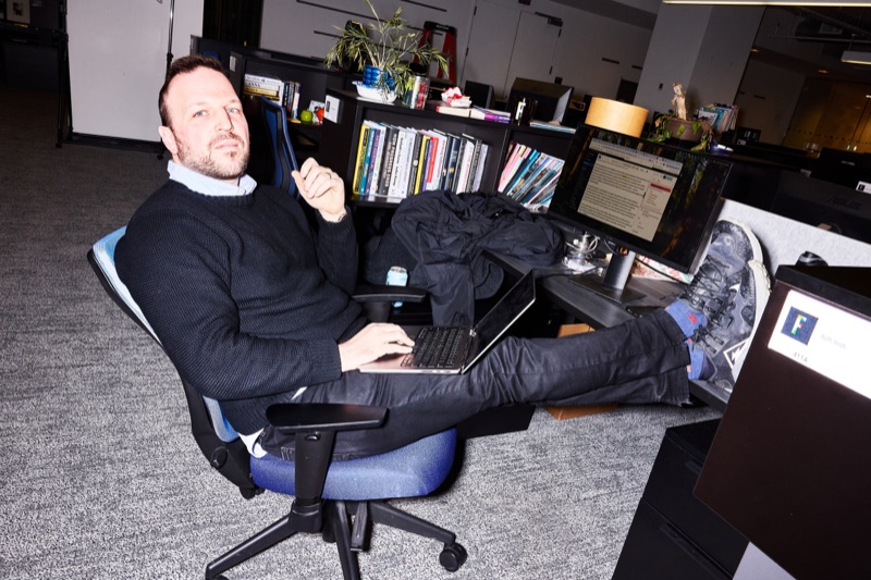 Journalist Nick Lichtenberg using NotebookLM at his desk